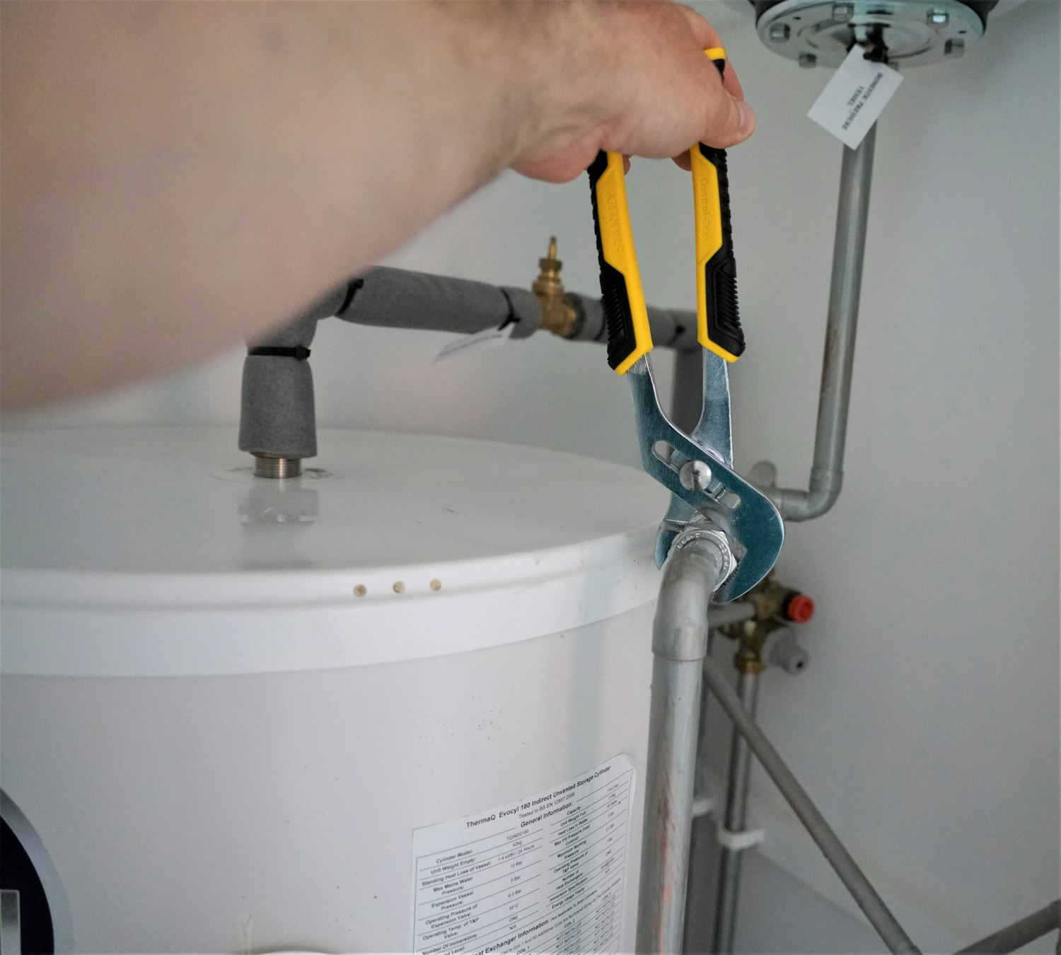 Plumber connecting a geyser